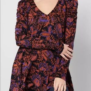 Tunic missing button in the back